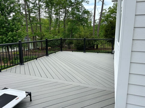 grey deck with black railing